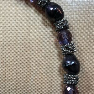 Purple beaded necklace.
